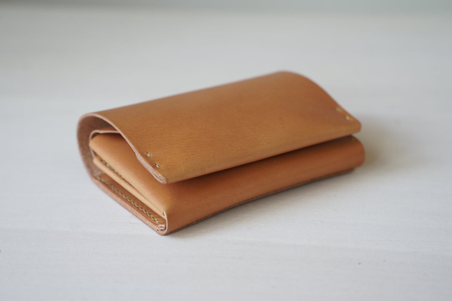 タテに仕舞う二つ折り財布